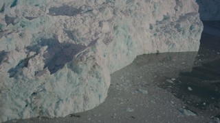 AK0001_1810 - 4K aerial stock footage the rough edge of a snow covered glacier on the Harriman Fjord, Alaska