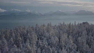 AK0001_1843 - 4K aerial stock footage the snow covered Chugach Mountains across Port Wells, Alaska