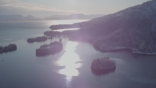 AK0001_1873 - 4K aerial stock footage snow covered islands at mouth of Hummer Bay, Port Wells, Alaska