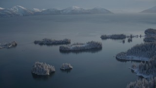 AK0001_1874 - 4K aerial stock footage small, snowy islands at mouth of Hummer Bay, Port Wells, Alaska