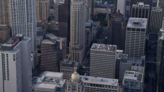 AX0001_036 - 4.8K aerial stock footage of tilt down to reveal InterContinental hotel and Tribune Tower in Downtown Chicago, Illinois