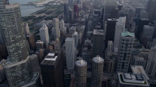 AX0001_041 - 4.8K aerial stock footage fly by of Trump International, then tilt down to reveal Marina City, Downtown Chicago, Illinois