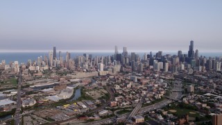 AX0001_063 - 4.8K stock footage aerial video the Downtown Chicago skyline seen from the west, on a hazy day, Illinois