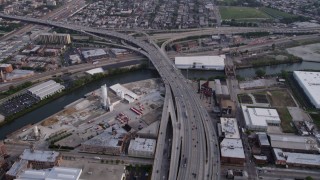 AX0001_074 - 4.8K aerial stock footage tilting from Interstate 90 and 94 near an interchange, West Chicago, Illinois