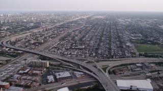 AX0001_075 - 4.8K aerial stock footage approaching Interstate 90, 94, and 55 interchange, urban neighborhood, South Chicago, Illinois