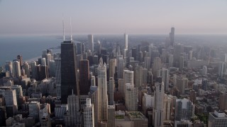 AX0001_089 - 4.8K aerial stock footage flying by John Hancock Center and downtown high-rises in Downtown Chicago, Illinois