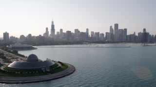 AX0001_100 - 4.8K aerial stock footage approach downtown skyline and harbor from Adler Planetarium, Downtown Chicago, Illinois