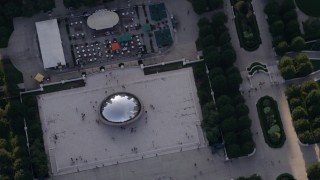AX0001_105 - 4.8K aerial stock footage bird's eye view of Cloud Gate sculpture at AT&T Plaza, Downtown Chicago, Illinois