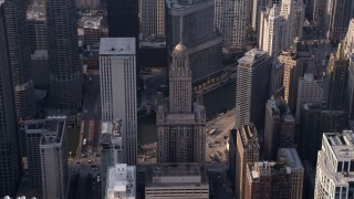 AX0001_116 - 4.8K aerial stock footage tilting down on Kemper Building and 35 East Wacker in Downtown Chicago, Illinois