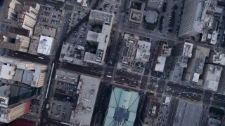 AX0001_142 - 4.8K aerial stock footage of a bird's eye view of Harold Washington Library Center and S State Street, Downtown Chicago, Illinois