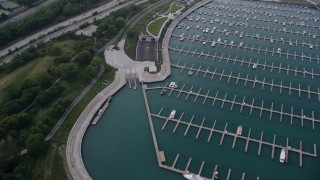 AX0001_156 - 4.8K aerial stock footage reverse view of 31st Street Harbor and Burnham Park, Chicago, Illinois