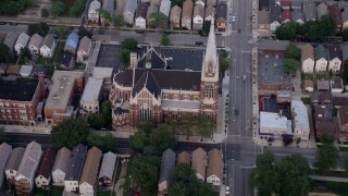 AX0001_161 - 4.8K aerial stock footage flying by St. Michael Catholic Church, Chicago, Illinois