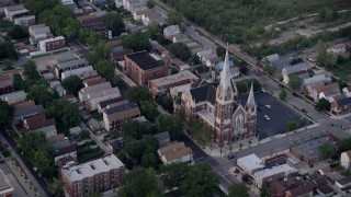 AX0001_162 - 4.8K aerial stock footage flying away from St. Michael Catholic Church, Chicago, Illinois