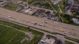 AX0001_175 - 4.8K aerial stock footage panning across Kingery Expressway on a hazy day, in Lansing, Chicago, Illinois
