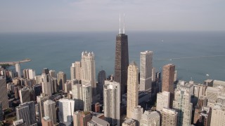 AX0002_012 - 4.8K aerial stock footage John Hancock Center near Lake Michigan, Downtown Chicago, Illinois