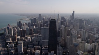 AX0002_016 - 4.8K aerial stock footage John Hancock Center and downtown skyscrapers, on a hazy day, Downtown Chicago, Illinois