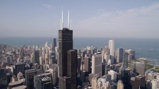 AX0002_032 - 4.8K aerial stock footage of flying away from Willis Tower in Downtown Chicago, Illinois