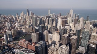 AX0002_034 - 4.8K aerial stock footage of Downtown Chicago skyscrapers seen from Willis Tower, reveal the Chicago River, Illinois