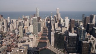 AX0002_038 - 4.8K aerial stock footage tilt from bird's eye of W Fulton Street to reveal the Chicago River and skyscrapers, Downtown Chicago, Illinois