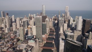 AX0002_039 - 4.8K aerial stock footage of following the Chicago River through Downtown Chicago, Illinois
