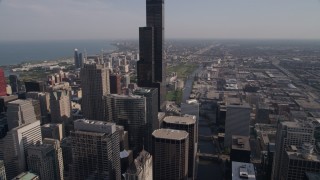 AX0002_057 - 4.8K aerial stock footage tilt from Chicago River to approach Willis Tower, Downtown Chicago, Illinois