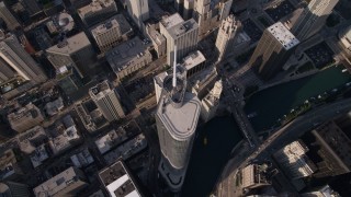 AX0002_071 - 4.8K aerial stock footage tilt to bird's eye view of Trump International Hotel and Tower and the Chicago River in Downtown Chicago, Illinois