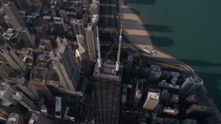 AX0002_075 - 4.8K aerial stock footage of tilting to a bird's eye view of John Hancock Center in Downtown Chicago, Illinois
