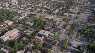 AX0002_099 - 4.8K aerial stock footage follow S Stony Island Avenue past urban neighborhoods, South Chicago, Illinois