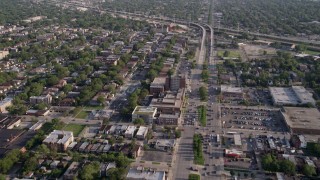 AX0002_100 - 4.8K aerial stock footage fly over Mosque Maryam and follow S Stony Island Avenue past urban neighborhoods, South Chicago, Illinois