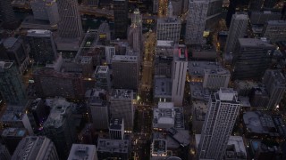 AX0003_098 - 4.8K aerial stock footage bird's eye view of N Michigan Avenue through Downtown Chicago at twilight, Illinois