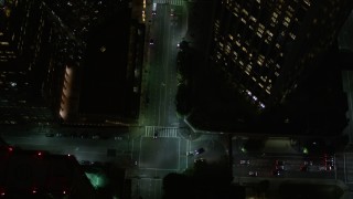 AX0004_052E - 5K aerial stock footage bird's eye view of South Hope Street in Downtown Los Angeles at night, California