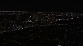 AX0004_085 - 5K aerial stock footage of Century City high-rises at night in California