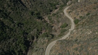 AX0005_009 - 5K aerial stock footage follow mountain road through San Gabriel Mountains in California