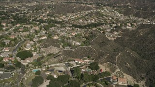 AX0005_010 - 5K stock footage aerial video fly over suburban neighborhoods in Santa Clarita, California