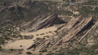 AX0005_038E - 5K stock footage aerial video of rock formations in the desert at Vasquez Rocks Park, California