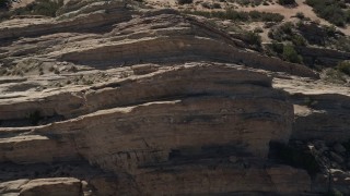 AX0005_040 - 5K aerial stock footage approach Vasquez Rocks Park formations in the Mojave Desert, California