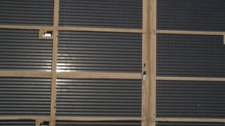 AX0005_105 - 5K aerial stock footage of bird's eye view of panels at a solar energy array in the desert of Antelope Valley, California