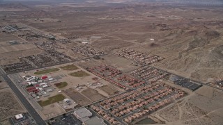 AX0006_101 - 5K aerial stock footage of small desert neighborhoods in Rosamond, California