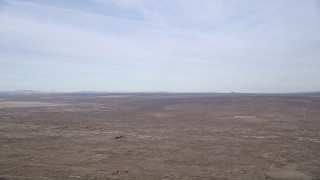 AX0006_110 - 5K aerial stock footage of a VFX Background Plate of open desert in California