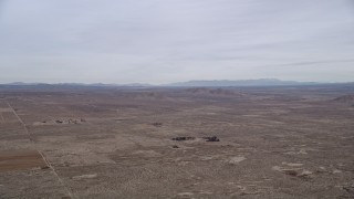 AX0006_111 - 5K aerial stock footage of a desert Background VFX Plate of the Mojave Desert, California