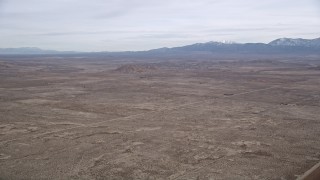 AX0006_113 - 5K aerial stock footage of a VFX Background Plate of open desert in the Mojave Desert, California