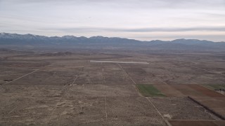 AX0006_114 - 5K aerial stock footage of VFX Background Plate of open desert and distant mountains, Mojave Desert, California