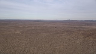 AX0006_116 - 5K aerial stock footage of desert Background VFX Plate of Mojave Desert in California