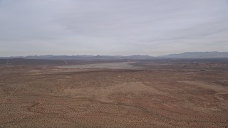 AX0006_122 - 5K aerial stock footage of VFX Background Plate of open desert and dry lake, Mojave Desert, California