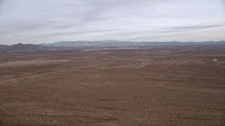 AX0006_151 - 5K aerial stock footage of a Mojave Desert Background VFX Plate, California