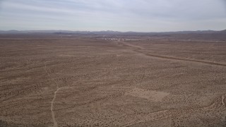 AX0006_154 - 5K aerial stock footage of a Desert VFX Plate near small town of Helendale, California