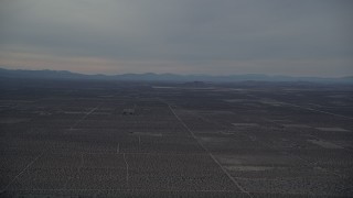 AX0007_021 - 5K aerial stock footage of Desert Background VFX Plate at Sunset, Mojave Desert, California