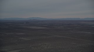 AX0007_022 - 5K aerial stock footage of Mojave Desert VFX Background Plate at Sunset, California