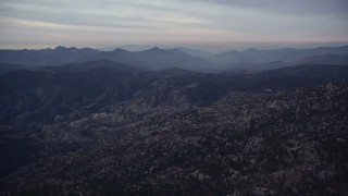 AX0008_035 - 5K aerial stock footage of approaching mountains at twilight in the San Gabriel Mountains, California