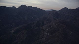AX0008_047 - 5K aerial stock footage of San Gabriel Mountains in California at twilight
